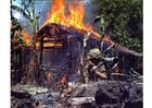 Foto campo Vietcong incendiato
