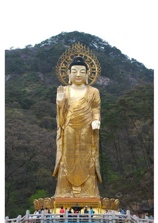 Foto statua Maitreya in oro