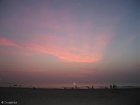 Foto tramonto in spiaggia